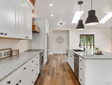 BACKING UP TH THE 11TH FAIRWAY OF DESERT HAWK GOLF COURSE THIS on Desert Hawk At Pueblo West in Colorado - for sale on GolfHomes.com, golf home, golf lot