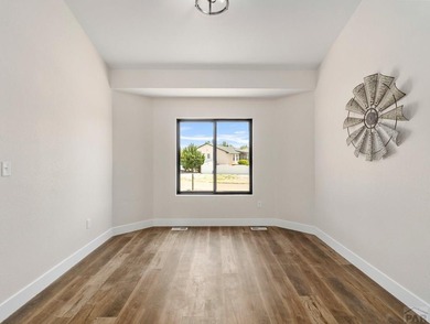 BACKING UP TH THE 11TH FAIRWAY OF DESERT HAWK GOLF COURSE THIS on Desert Hawk At Pueblo West in Colorado - for sale on GolfHomes.com, golf home, golf lot