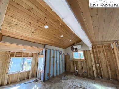 Two bedroom, two bath home renovated in 2023 then flooded in on Land Harbor Golf Course in North Carolina - for sale on GolfHomes.com, golf home, golf lot