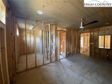 Two bedroom, two bath home renovated in 2023 then flooded in on Land Harbor Golf Course in North Carolina - for sale on GolfHomes.com, golf home, golf lot