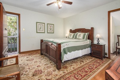 Tucked down a long drive, amid ancient oaks and sabal palms on Bald Head Island Golf Club in North Carolina - for sale on GolfHomes.com, golf home, golf lot