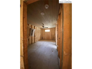 Two bedroom, two bath home renovated in 2023 then flooded in on Land Harbor Golf Course in North Carolina - for sale on GolfHomes.com, golf home, golf lot