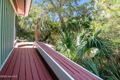 Tucked down a long drive, amid ancient oaks and sabal palms on Bald Head Island Golf Club in North Carolina - for sale on GolfHomes.com, golf home, golf lot