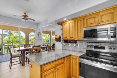 Nestled on tranquil Flamingo Island, this impeccably maintained on Sombrero Golf and Country Club in Florida - for sale on GolfHomes.com, golf home, golf lot