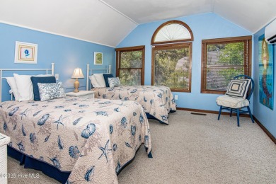 Tucked down a long drive, amid ancient oaks and sabal palms on Bald Head Island Golf Club in North Carolina - for sale on GolfHomes.com, golf home, golf lot