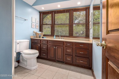 Tucked down a long drive, amid ancient oaks and sabal palms on Bald Head Island Golf Club in North Carolina - for sale on GolfHomes.com, golf home, golf lot