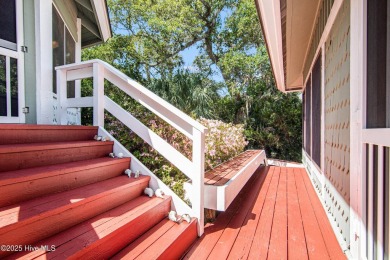 Tucked down a long drive, amid ancient oaks and sabal palms on Bald Head Island Golf Club in North Carolina - for sale on GolfHomes.com, golf home, golf lot
