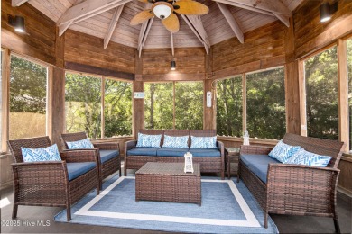 Tucked down a long drive, amid ancient oaks and sabal palms on Bald Head Island Golf Club in North Carolina - for sale on GolfHomes.com, golf home, golf lot