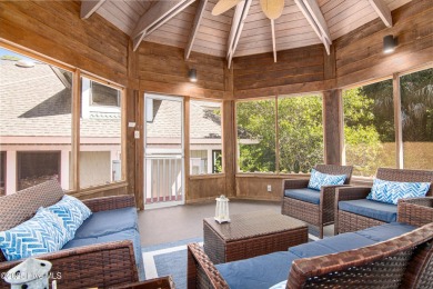 Tucked down a long drive, amid ancient oaks and sabal palms on Bald Head Island Golf Club in North Carolina - for sale on GolfHomes.com, golf home, golf lot