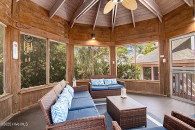 Tucked down a long drive, amid ancient oaks and sabal palms on Bald Head Island Golf Club in North Carolina - for sale on GolfHomes.com, golf home, golf lot
