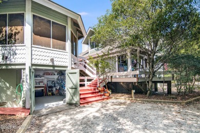 Tucked down a long drive, amid ancient oaks and sabal palms on Bald Head Island Golf Club in North Carolina - for sale on GolfHomes.com, golf home, golf lot