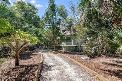 Tucked down a long drive, amid ancient oaks and sabal palms on Bald Head Island Golf Club in North Carolina - for sale on GolfHomes.com, golf home, golf lot