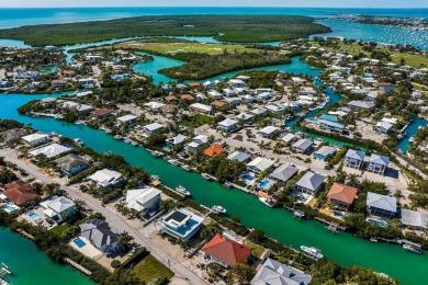 Nestled on tranquil Flamingo Island, this impeccably maintained on Sombrero Golf and Country Club in Florida - for sale on GolfHomes.com, golf home, golf lot