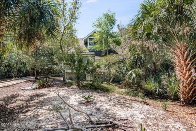Tucked down a long drive, amid ancient oaks and sabal palms on Bald Head Island Golf Club in North Carolina - for sale on GolfHomes.com, golf home, golf lot