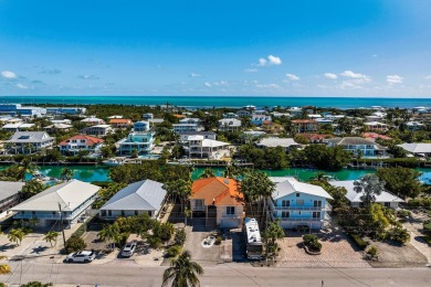 Nestled on tranquil Flamingo Island, this impeccably maintained on Sombrero Golf and Country Club in Florida - for sale on GolfHomes.com, golf home, golf lot