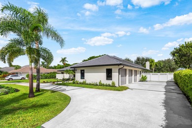 Experience refined luxury in this true designer Smart Home on Pine Tree Golf Club in Florida - for sale on GolfHomes.com, golf home, golf lot