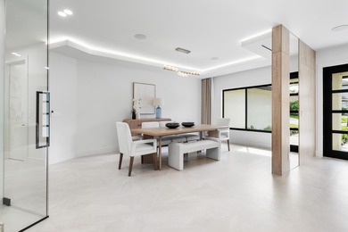 Experience refined luxury in this true designer Smart Home on Pine Tree Golf Club in Florida - for sale on GolfHomes.com, golf home, golf lot