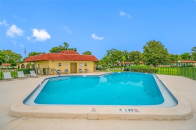 Welcome to this beautifully updated 2BR/2BA/1 car garage Villa on Largo Golf Course in Florida - for sale on GolfHomes.com, golf home, golf lot