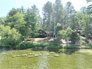 Less than a mile from downtown Walker, this beautifully crafted on Tianna Country Club in Minnesota - for sale on GolfHomes.com, golf home, golf lot