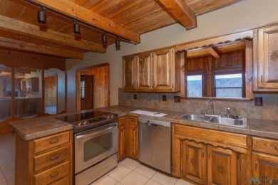 Welcome home! This charming 3-bedroom, 2-bath home is full of on Roswell Country Club in New Mexico - for sale on GolfHomes.com, golf home, golf lot