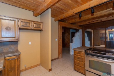 Welcome home! This charming 3-bedroom, 2-bath home is full of on Roswell Country Club in New Mexico - for sale on GolfHomes.com, golf home, golf lot