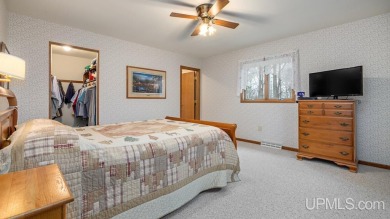 Custom-built home on the 16th green of top-rated Timberstone on TimberStone At Pine Mountain in Michigan - for sale on GolfHomes.com, golf home, golf lot