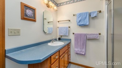 Custom-built home on the 16th green of top-rated Timberstone on TimberStone At Pine Mountain in Michigan - for sale on GolfHomes.com, golf home, golf lot