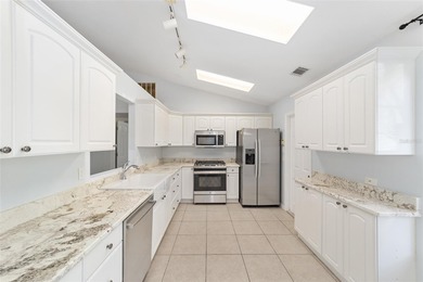 Welcome to Sutherland Crossing! Beautifully updated 4/2 home on on Haile Plantation Golf and Country Club in Florida - for sale on GolfHomes.com, golf home, golf lot