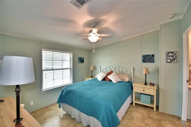 WELCOME TO YOUR FLORIDA RETIREMENT OASIS IN A GATED 55+COMMUNITY on Southern Dunes Golf and Country Club in Florida - for sale on GolfHomes.com, golf home, golf lot
