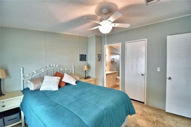 WELCOME TO YOUR FLORIDA RETIREMENT OASIS IN A GATED 55+COMMUNITY on Southern Dunes Golf and Country Club in Florida - for sale on GolfHomes.com, golf home, golf lot