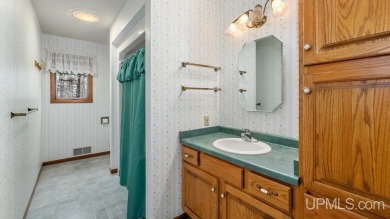 Custom-built home on the 16th green of top-rated Timberstone on TimberStone At Pine Mountain in Michigan - for sale on GolfHomes.com, golf home, golf lot