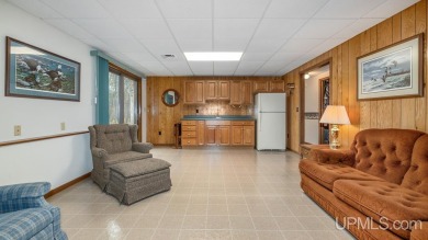Custom-built home on the 16th green of top-rated Timberstone on TimberStone At Pine Mountain in Michigan - for sale on GolfHomes.com, golf home, golf lot