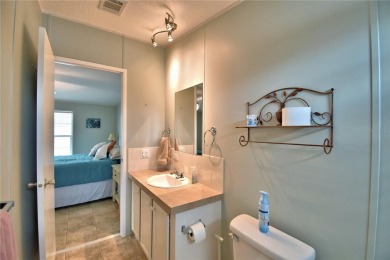WELCOME TO YOUR FLORIDA RETIREMENT OASIS IN A GATED 55+COMMUNITY on Southern Dunes Golf and Country Club in Florida - for sale on GolfHomes.com, golf home, golf lot