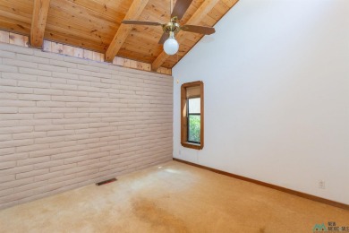 Welcome home! This charming 3-bedroom, 2-bath home is full of on Roswell Country Club in New Mexico - for sale on GolfHomes.com, golf home, golf lot