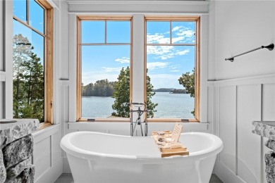 Defining lakeside luxury, this custom-built residence on one of on The Reserve At Lake Keowee in South Carolina - for sale on GolfHomes.com, golf home, golf lot