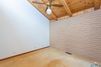 Welcome home! This charming 3-bedroom, 2-bath home is full of on Roswell Country Club in New Mexico - for sale on GolfHomes.com, golf home, golf lot