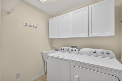 FABULOUS, TURNKEY (GOLF CART included), BLOCK and STUCCO 3/2 on Amberwood Executive Golf Course in Florida - for sale on GolfHomes.com, golf home, golf lot