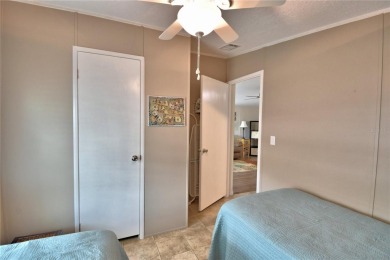 WELCOME TO YOUR FLORIDA RETIREMENT OASIS IN A GATED 55+COMMUNITY on Southern Dunes Golf and Country Club in Florida - for sale on GolfHomes.com, golf home, golf lot