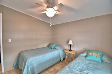 WELCOME TO YOUR FLORIDA RETIREMENT OASIS IN A GATED 55+COMMUNITY on Southern Dunes Golf and Country Club in Florida - for sale on GolfHomes.com, golf home, golf lot