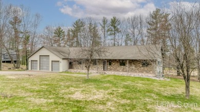 Custom-built home on the 16th green of top-rated Timberstone on TimberStone At Pine Mountain in Michigan - for sale on GolfHomes.com, golf home, golf lot