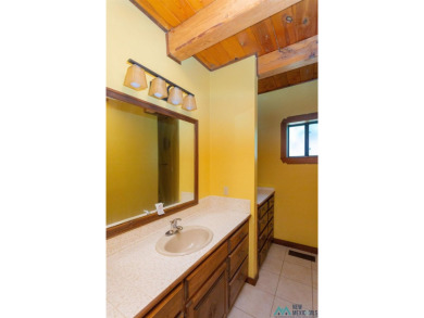 Welcome home! This charming 3-bedroom, 2-bath home is full of on Roswell Country Club in New Mexico - for sale on GolfHomes.com, golf home, golf lot