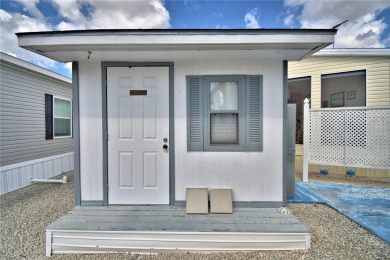 WELCOME TO YOUR FLORIDA RETIREMENT OASIS IN A GATED 55+COMMUNITY on Southern Dunes Golf and Country Club in Florida - for sale on GolfHomes.com, golf home, golf lot