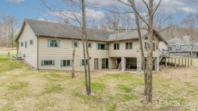 Custom-built home on the 16th green of top-rated Timberstone on TimberStone At Pine Mountain in Michigan - for sale on GolfHomes.com, golf home, golf lot