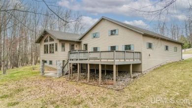 Custom-built home on the 16th green of top-rated Timberstone on TimberStone At Pine Mountain in Michigan - for sale on GolfHomes.com, golf home, golf lot