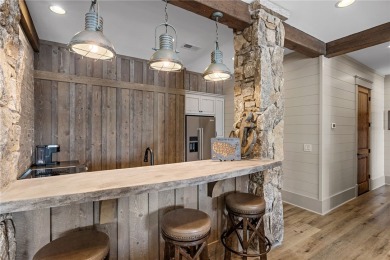 Defining lakeside luxury, this custom-built residence on one of on The Reserve At Lake Keowee in South Carolina - for sale on GolfHomes.com, golf home, golf lot