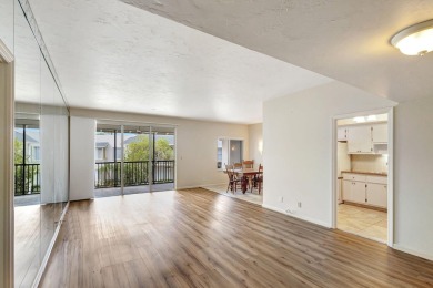SPACIOUS ONE BEDROOM CONDO OVERLOOKING THE COURTYARD WITH ONE on BallenIsles Golf and Country Club in Florida - for sale on GolfHomes.com, golf home, golf lot