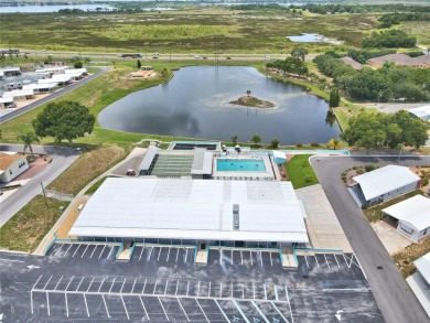 WELCOME TO YOUR FLORIDA RETIREMENT OASIS IN A GATED 55+COMMUNITY on Southern Dunes Golf and Country Club in Florida - for sale on GolfHomes.com, golf home, golf lot