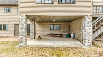 Custom-built home on the 16th green of top-rated Timberstone on TimberStone At Pine Mountain in Michigan - for sale on GolfHomes.com, golf home, golf lot