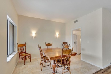 SPACIOUS ONE BEDROOM CONDO OVERLOOKING THE COURTYARD WITH ONE on BallenIsles Golf and Country Club in Florida - for sale on GolfHomes.com, golf home, golf lot