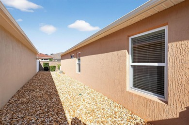 FABULOUS, TURNKEY (GOLF CART included), BLOCK and STUCCO 3/2 on Amberwood Executive Golf Course in Florida - for sale on GolfHomes.com, golf home, golf lot